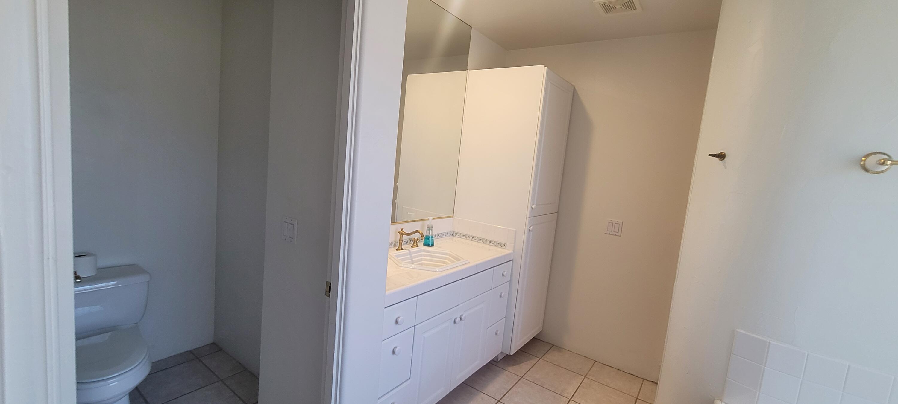 39914 Morningsprings Road Rancho Mirage, CA 92270 - Photo 43 of 54 a bathroom with a bathtub and a sink
