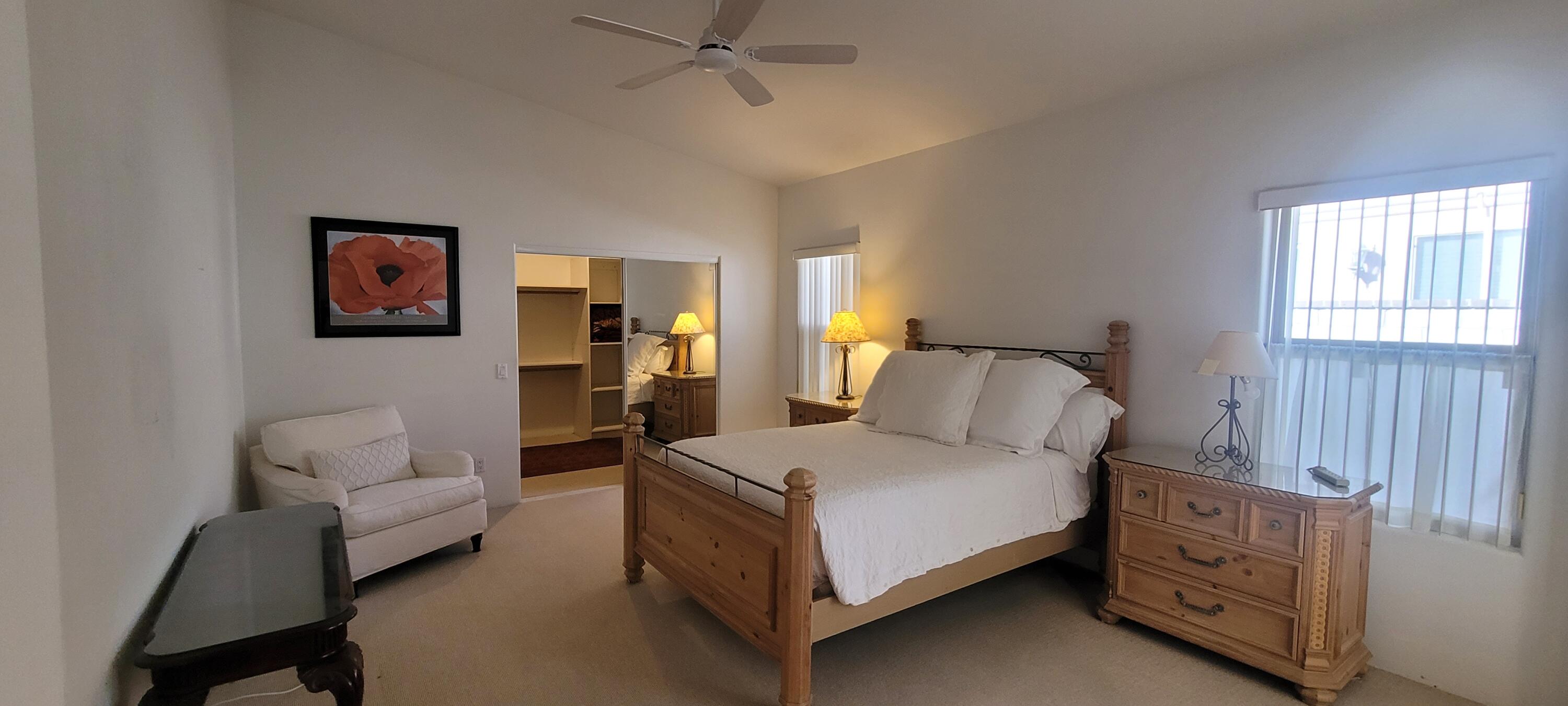 39914 Morningsprings Road Rancho Mirage, CA 92270 - Photo 48 of 54 a bed room with a bed and a couch