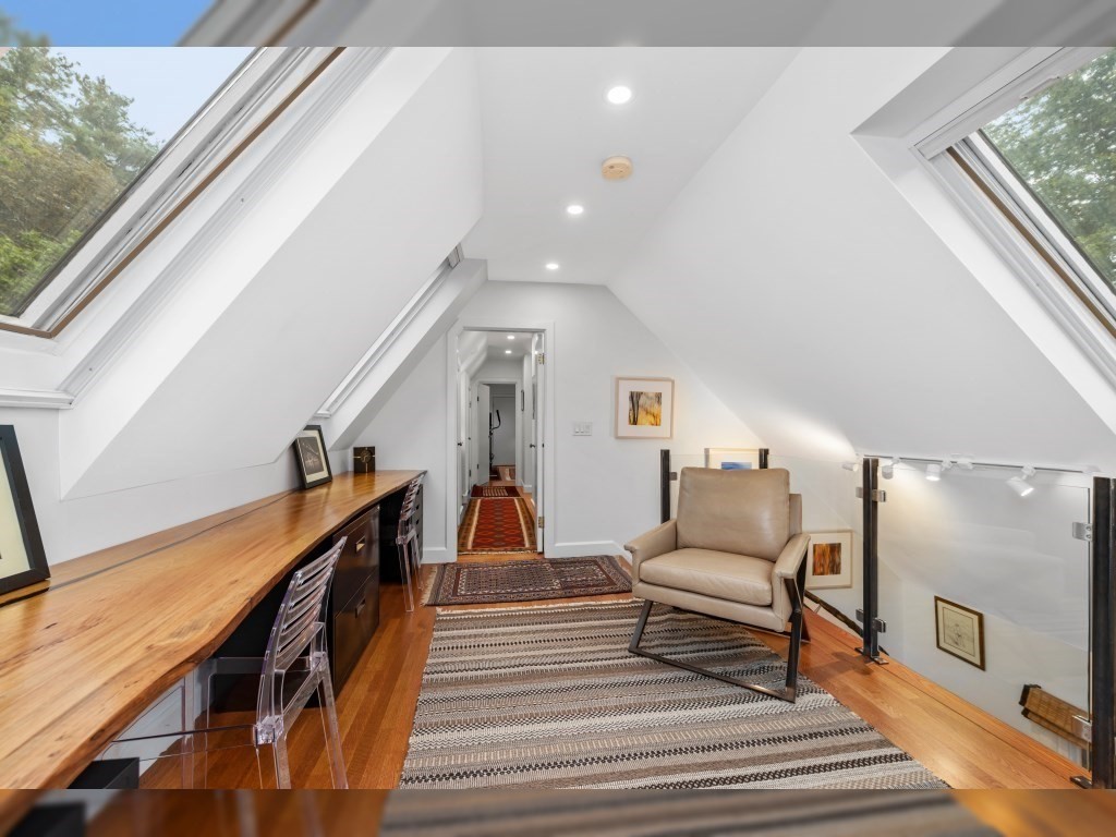 76 Ober Road, Unit 76 Newton, MA 02459 - Photo 13 of 32 a living room with furniture and a rug