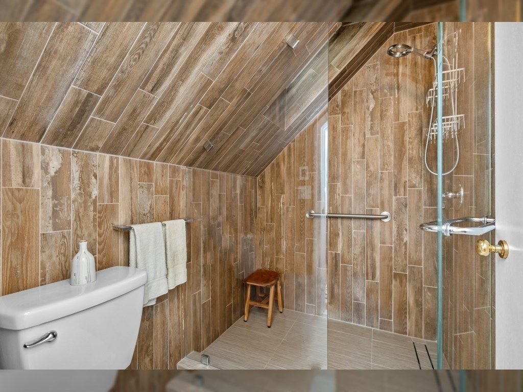 76 Ober Road, Unit 76 Newton, MA 02459 - Photo 17 of 32 a bathroom with a bathtub and shower