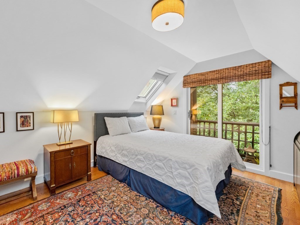 76 Ober Road, Unit 76 Newton, MA 02459 - Photo 18 of 32 a bedroom with a bed and a window