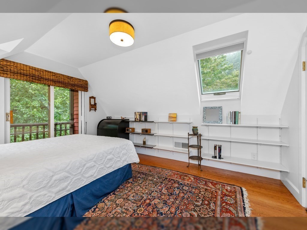 76 Ober Road, Unit 76 Newton, MA 02459 - Photo 19 of 32 a bedroom with a bed and window