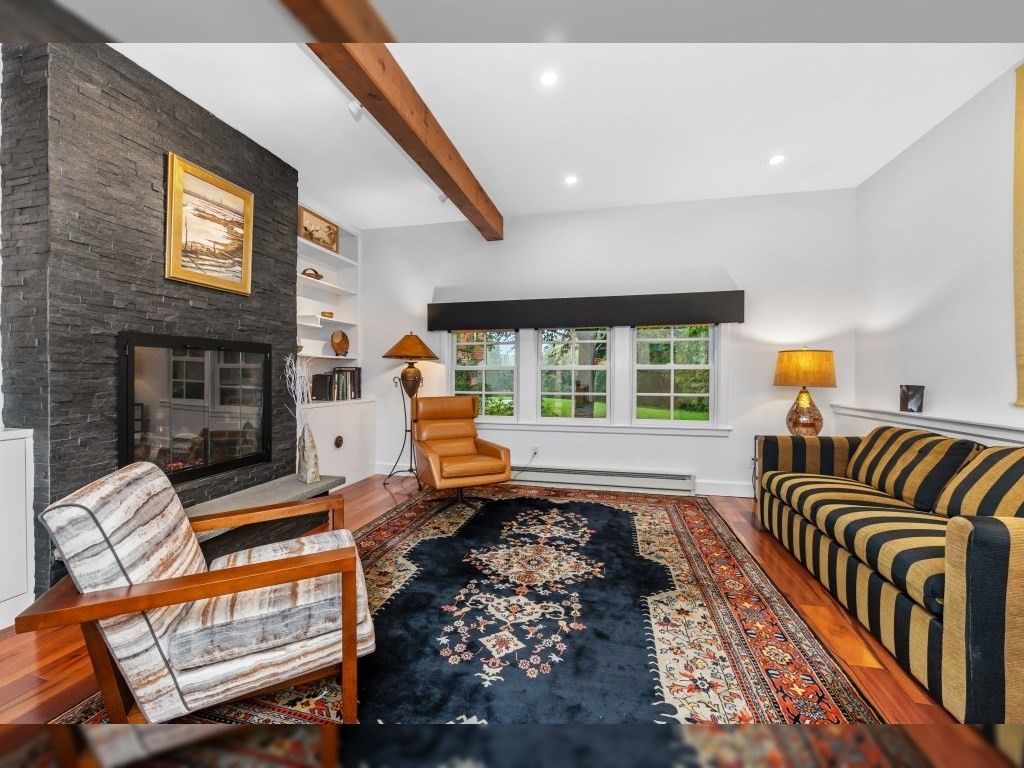 76 Ober Road, Unit 76 Newton, MA 02459 - Photo 3 of 32 a bedroom with furniture and a fireplace