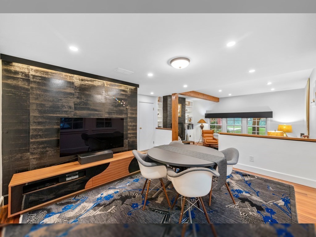 76 Ober Road, Unit 76 Newton, MA 02459 - Photo 6 of 32 a kitchen with a table and chairs in it
