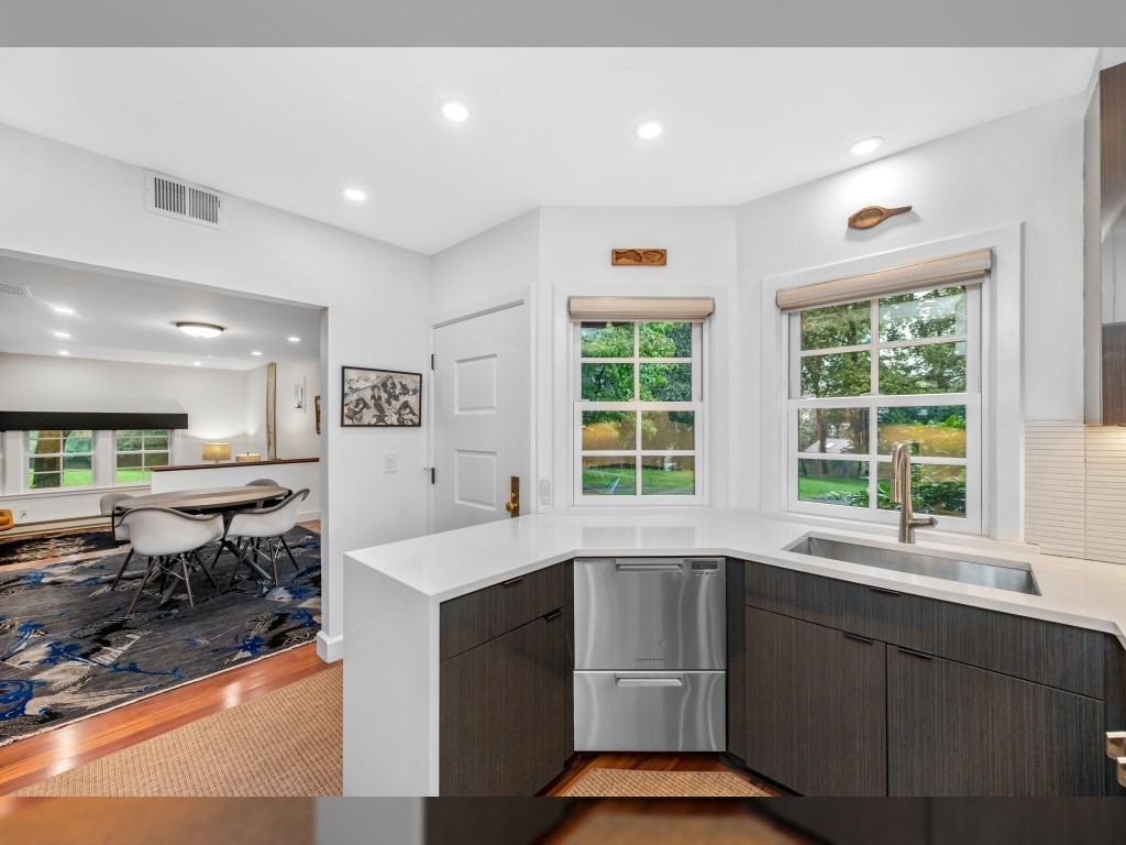 76 Ober Road, Unit 76 Newton, MA 02459 - Photo 7 of 32 a kitchen with a sink cabinets and window