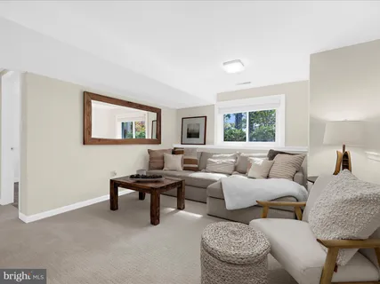 a bedroom with bed and windows