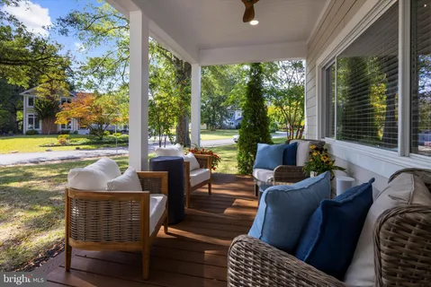 a outdoor space with patio the couches and pool table and chairs
