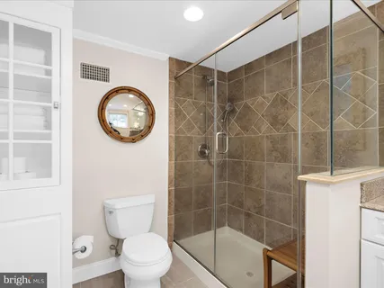 a bathroom with a sink a toilet and a bathtub