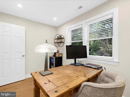 a view of a park with swings and slides