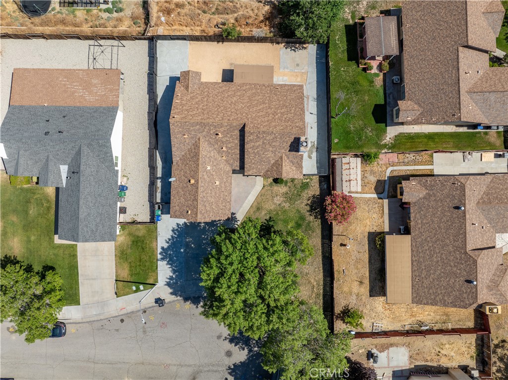 4225 Saddleback Road Palmdale, CA 93552 - Photo 14 of 61 an aerial view of a house with a yard and large tree