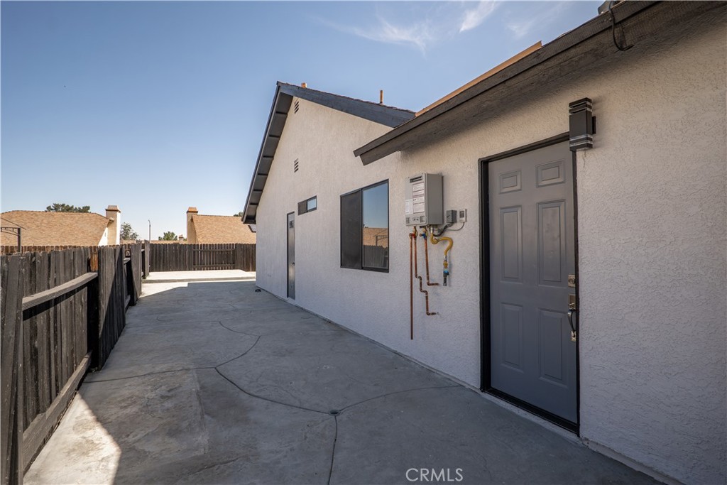 4225 Saddleback Road Palmdale, CA 93552 - Photo 41 of 61 a view of a house with entryway and stairs
