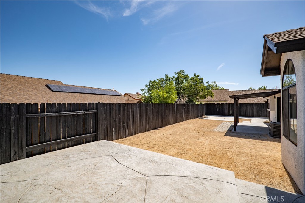 4225 Saddleback Road Palmdale, CA 93552 - Photo 44 of 61 a house with swimming pool in front of it