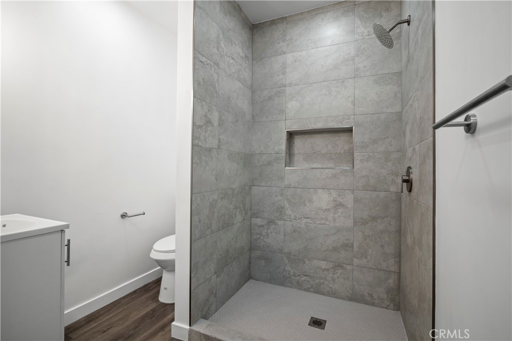 4225 Saddleback Road Palmdale, CA 93552 - Photo 59 of 61 a bathroom with a shower and a toilet