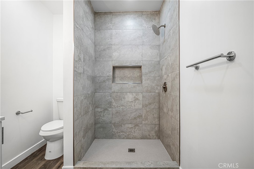 4225 Saddleback Road Palmdale, CA 93552 - Photo 60 of 61 a bathroom with a shower and a toilet