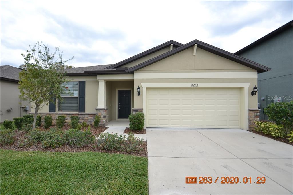 5012 Wabash Place Riverview, FL 33578 - Photo 1 of 1 a front view of house with garage and yard