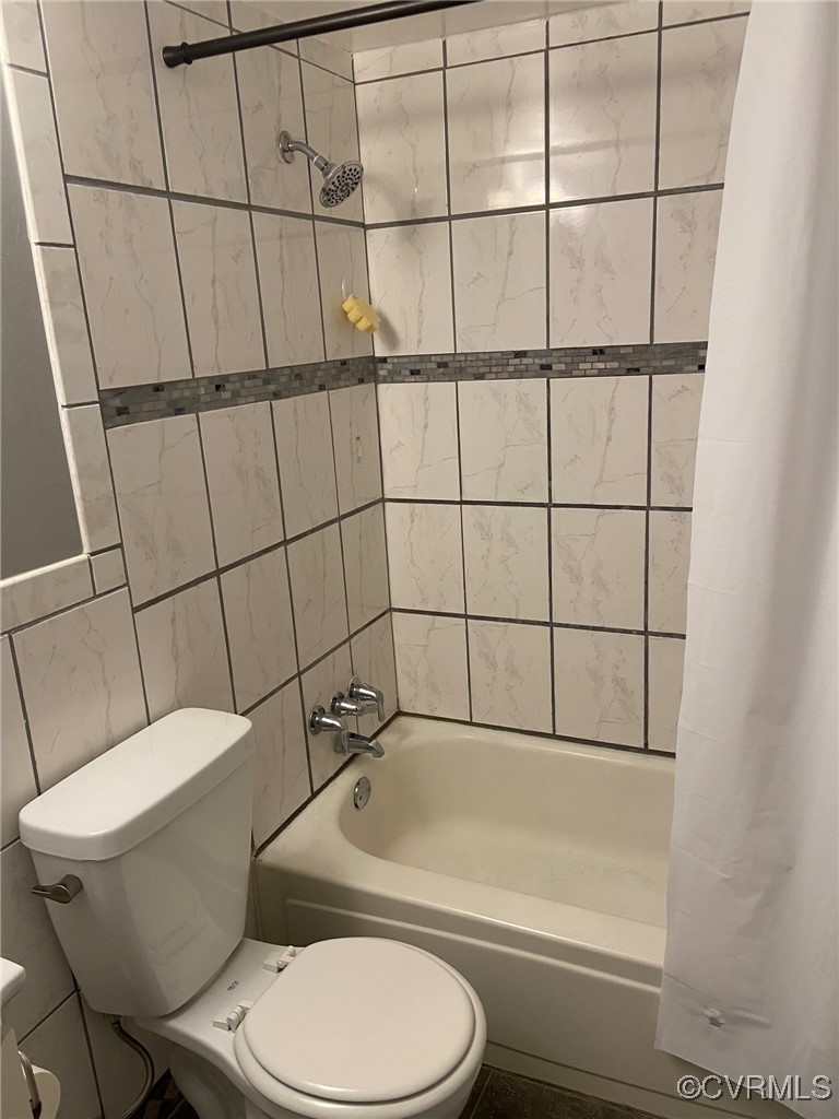9 Millstone Road, Unit 9 Henrico, VA 23228 - Photo 22 of 27 a white toilet sitting next to a bathroom sink