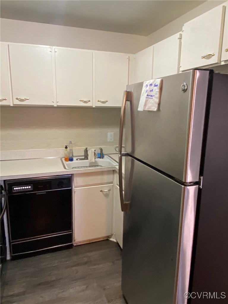 9 Millstone Road, Unit 9 Henrico, VA 23228 - Photo 10 of 27 a white refrigerator freezer sitting in a kitchen