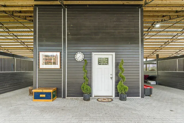 a view of a brick door of the house