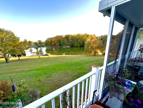 a view of a house with a big yard