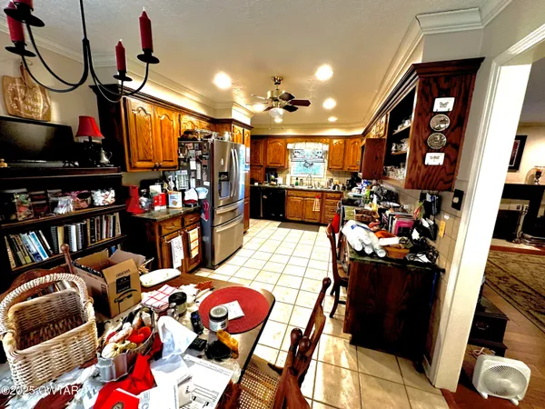 a living room with lots of furniture and a flat screen tv