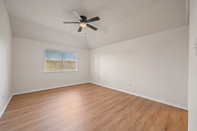 a room with a sink and a mirror