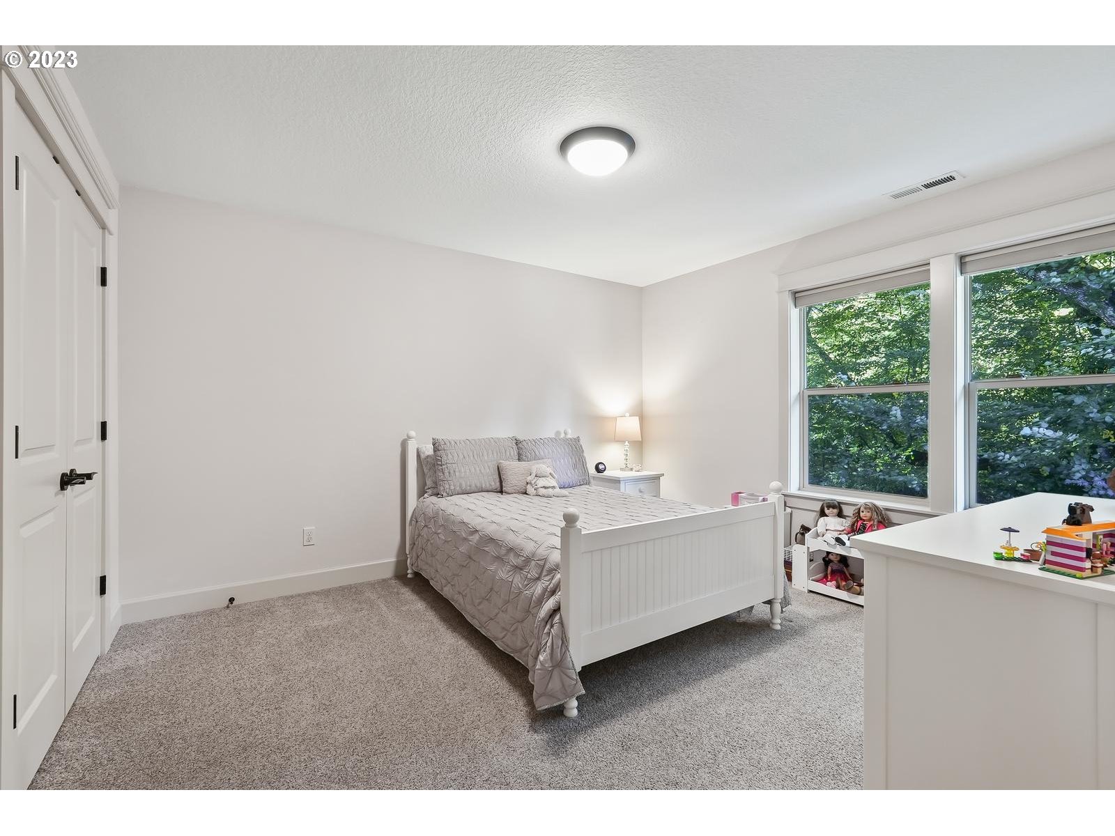 4845 Upper Drive Lake Oswego, OR 97035 - Photo 21 of 35 a room with a bed and a window