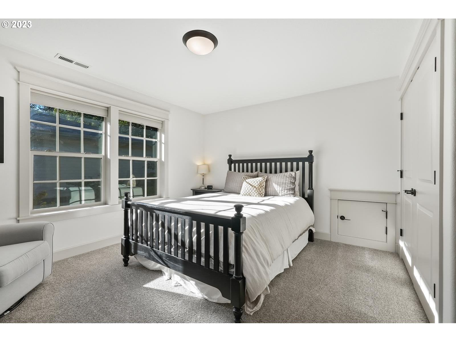 4845 Upper Drive Lake Oswego, OR 97035 - Photo 23 of 35 a bedroom with a bed and a window