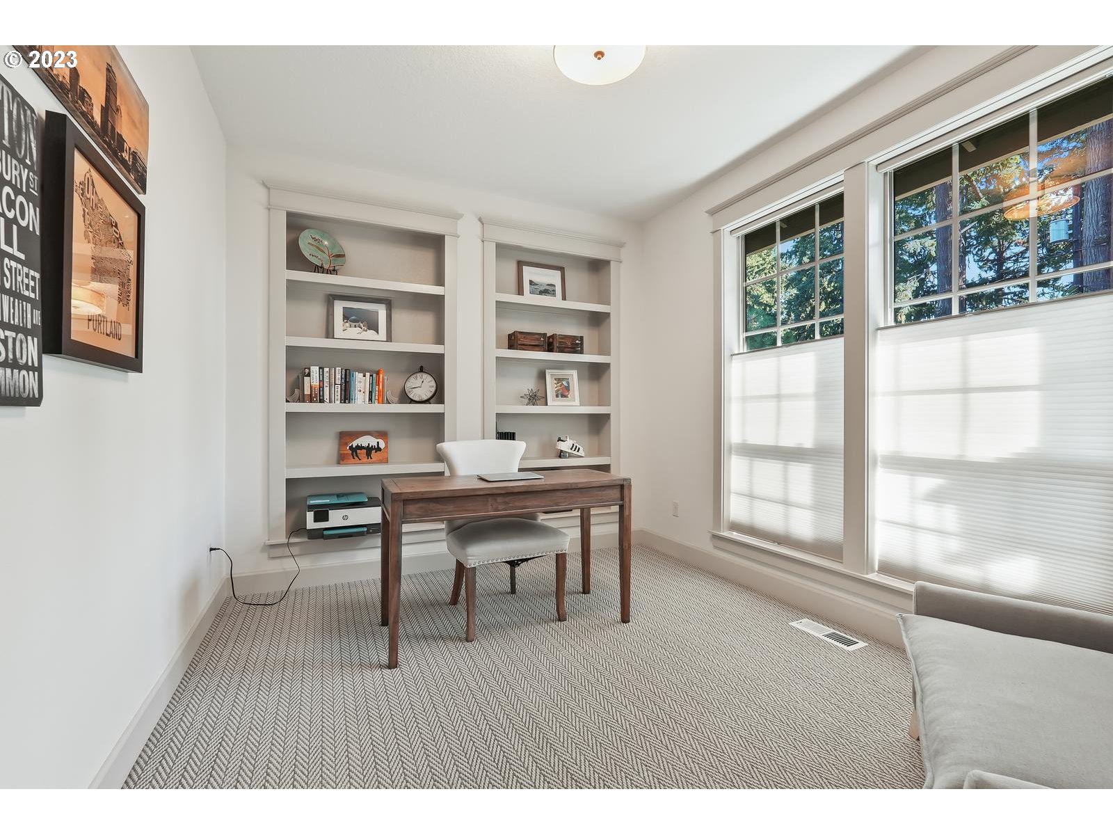 4845 Upper Drive Lake Oswego, OR 97035 - Photo 5 of 35 a view of a workspace room with wooden floor and windows