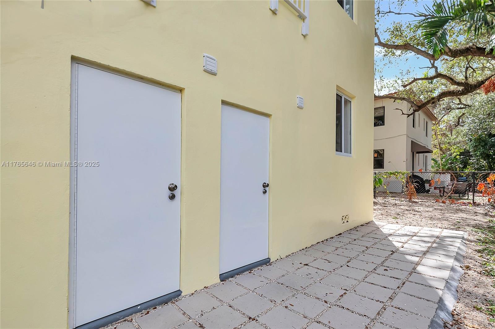 3402 Day Avenue Miami, FL 33133 - Photo 12 of 21 a view of a house with a yard