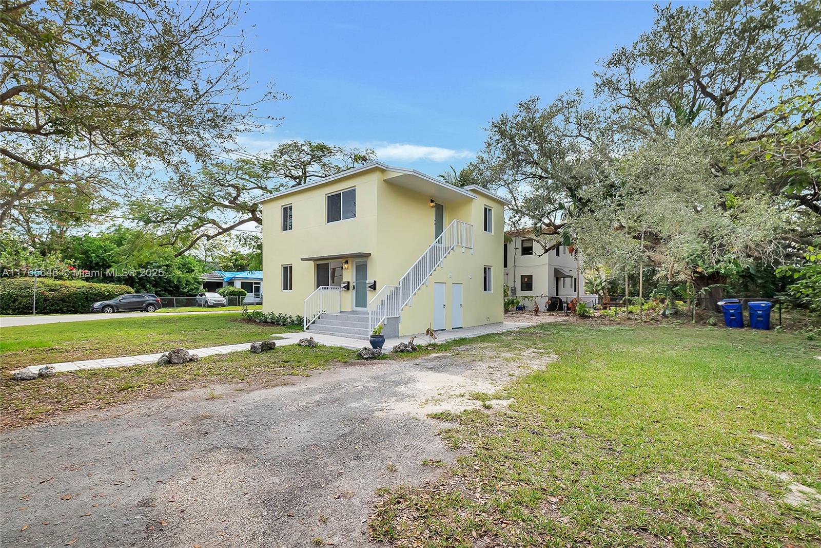 3402 Day Avenue Miami, FL 33133 - Photo 14 of 21 a view of a house with a yard