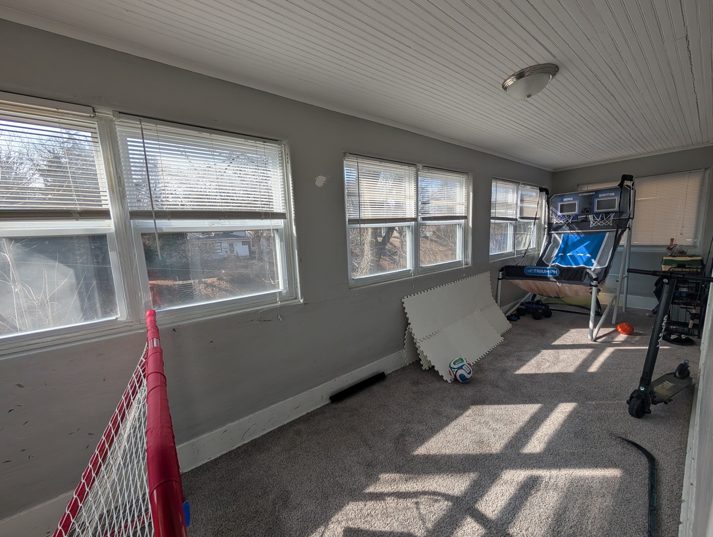 1118 15th Street Moline, IL 61265 - Photo 5 of 11 a living room with furniture and a window