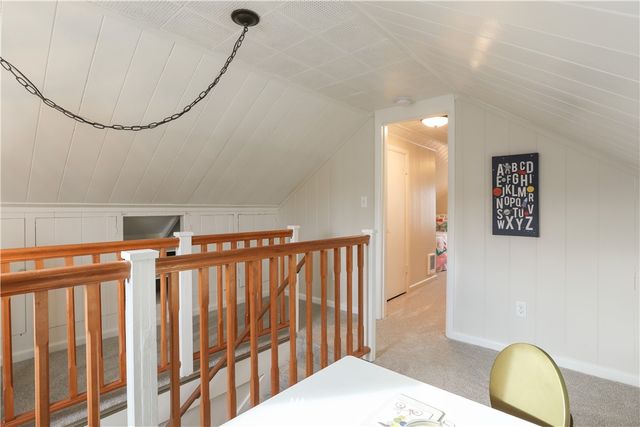 a bathroom with a sink mirror and toilet