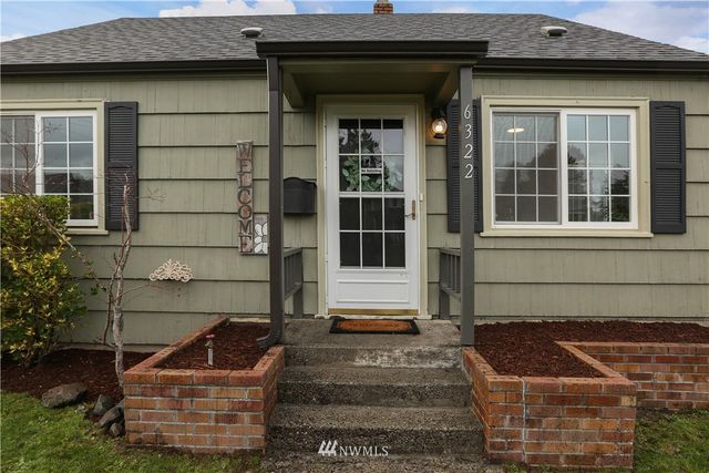 a front view of a house with outdoor space
