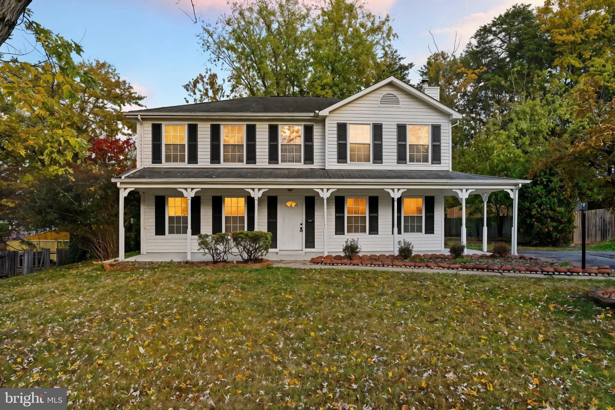 13357 Pelican Road Woodbridge, VA 22193 - Photo 2 of 48 a front view of house with yard