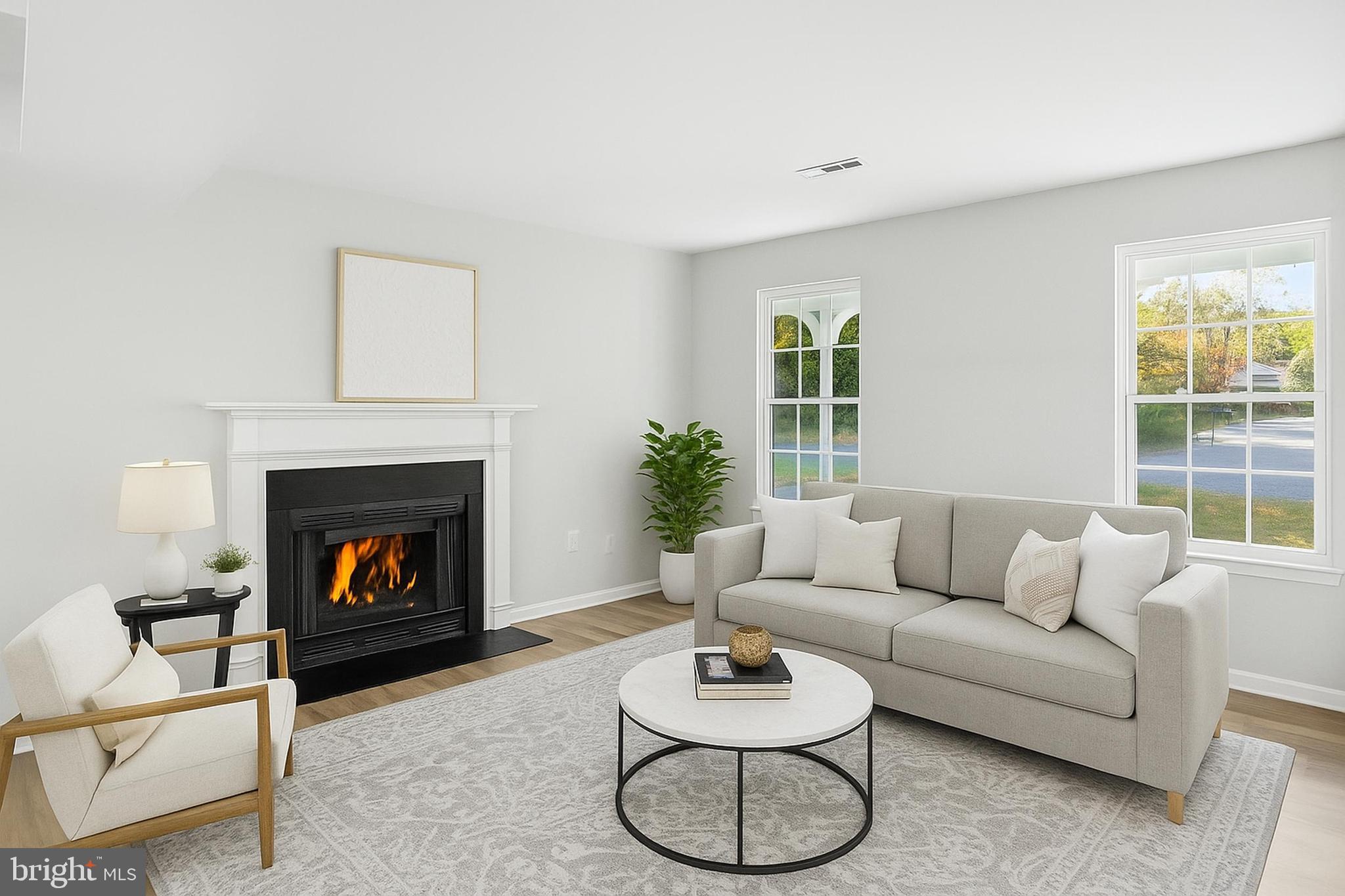 13357 Pelican Road Woodbridge, VA 22193 - Photo 22 of 48 a living room with furniture and a fireplace
