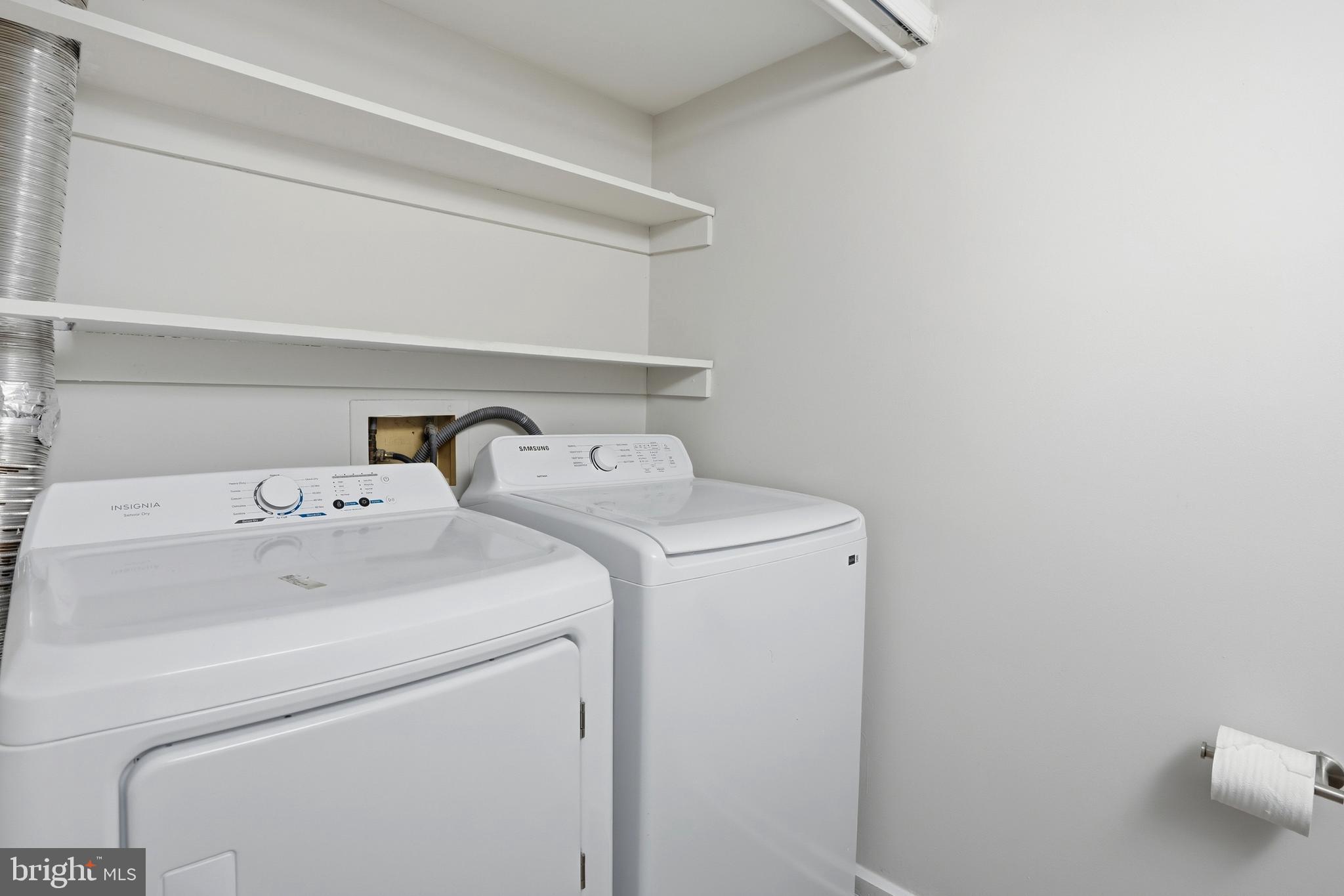 13357 Pelican Road Woodbridge, VA 22193 - Photo 28 of 48 a utility room with dryer and washer