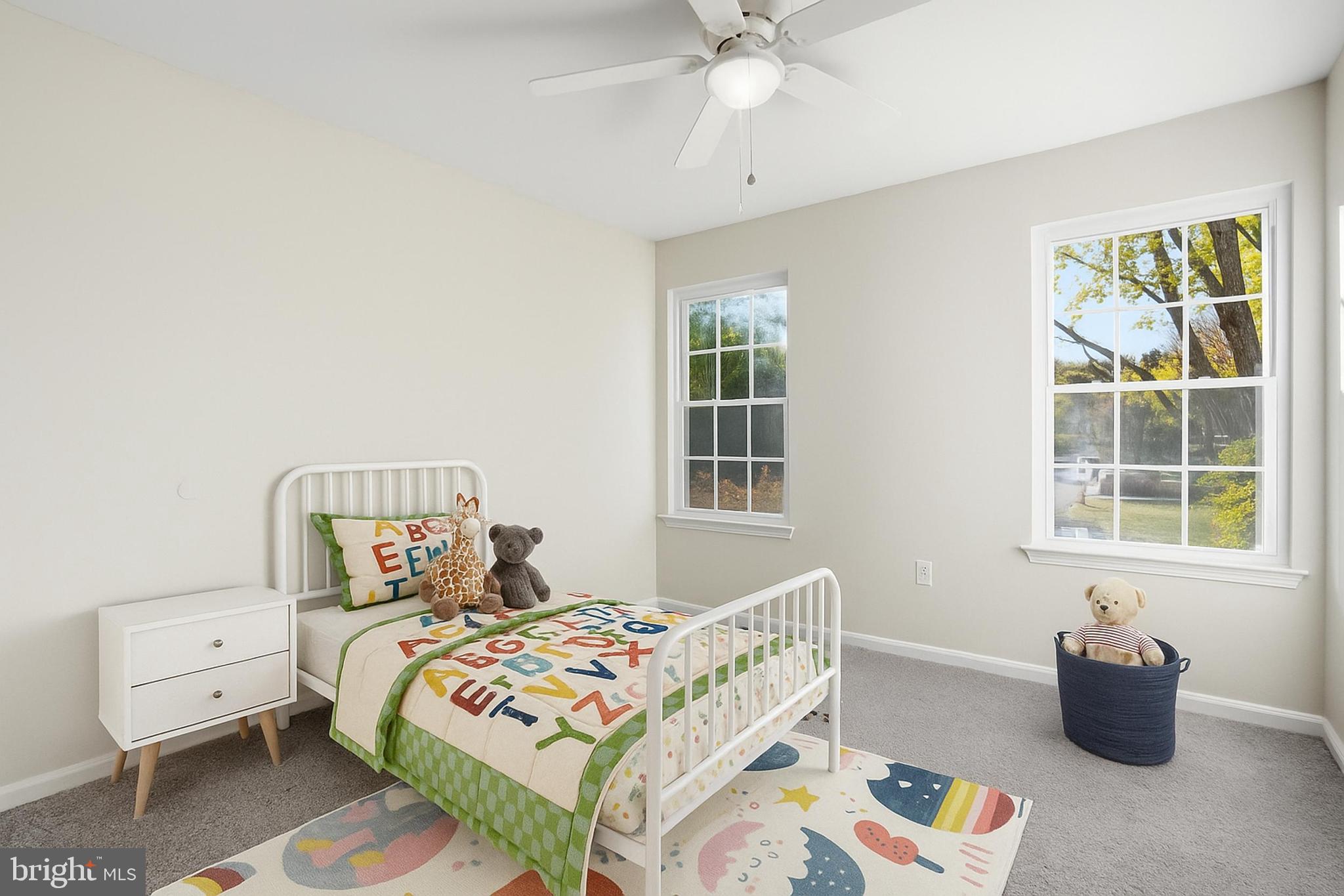 13357 Pelican Road Woodbridge, VA 22193 - Photo 35 of 48 a bedroom with a bed and wooden floor