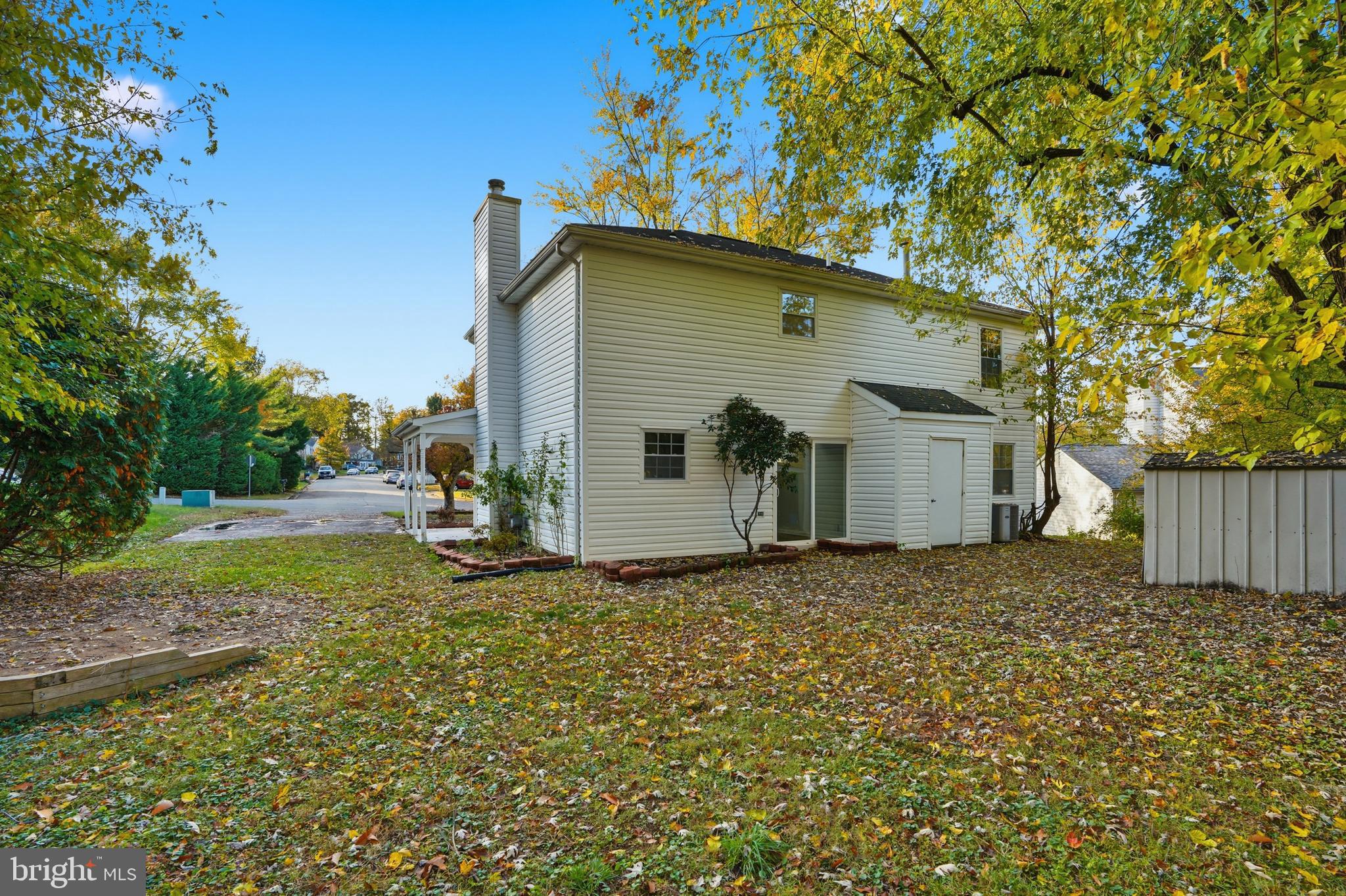 13357 Pelican Road Woodbridge, VA 22193 - Photo 40 of 48 a view of a house with a yard