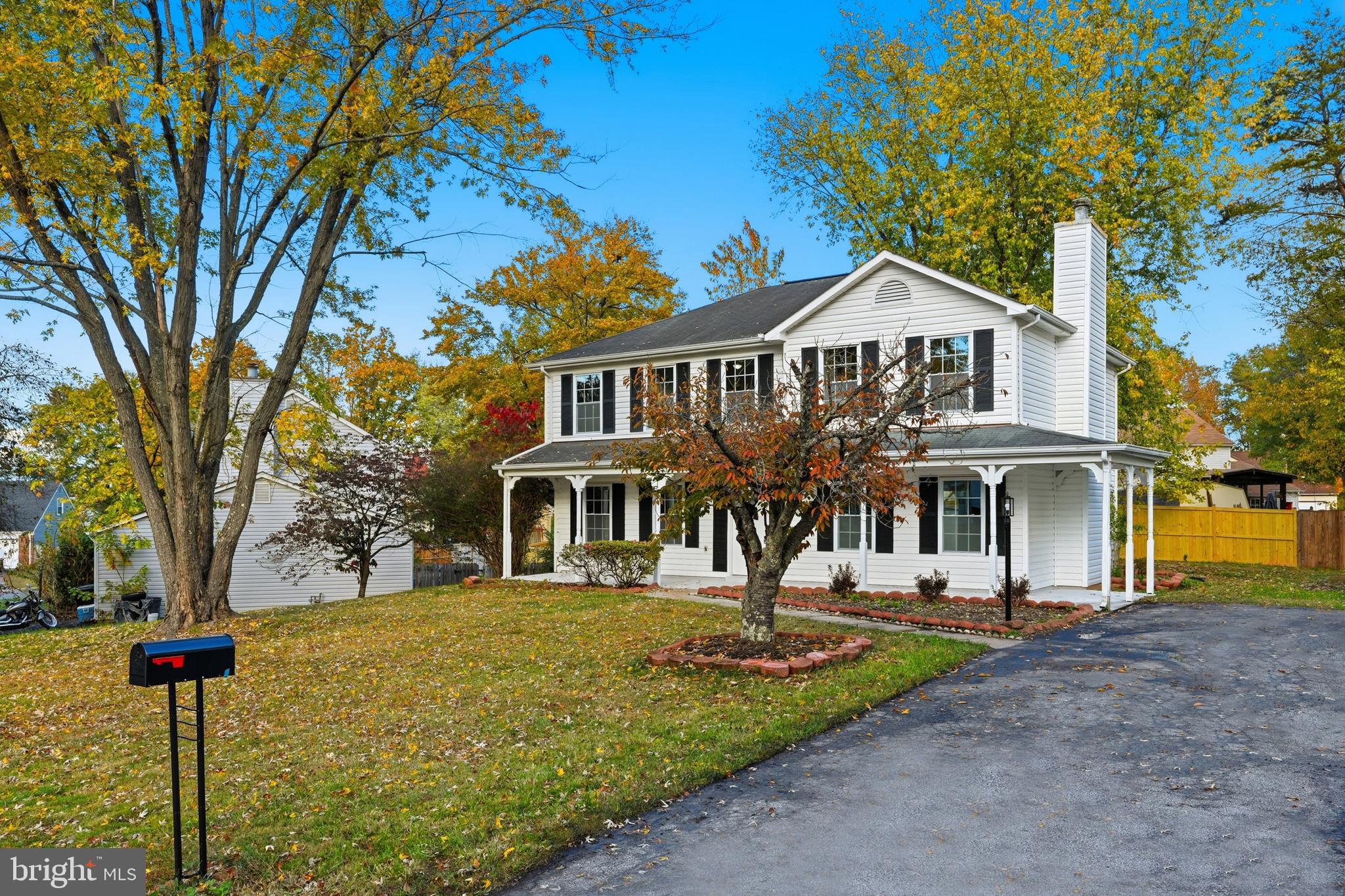 13357 Pelican Road Woodbridge, VA 22193 - Photo 41 of 48 a front view of a house with a yard