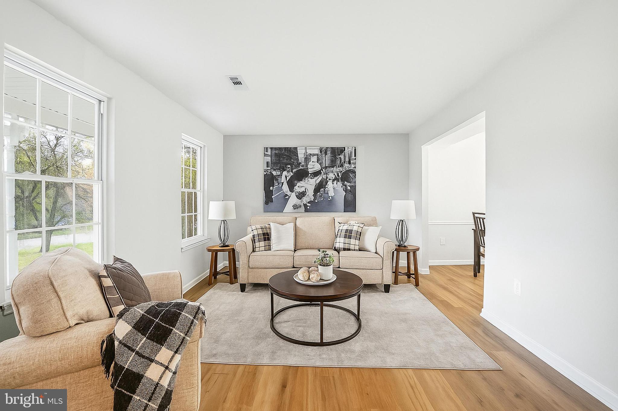 13357 Pelican Road Woodbridge, VA 22193 - Photo 9 of 48 a living room with furniture a window and a table