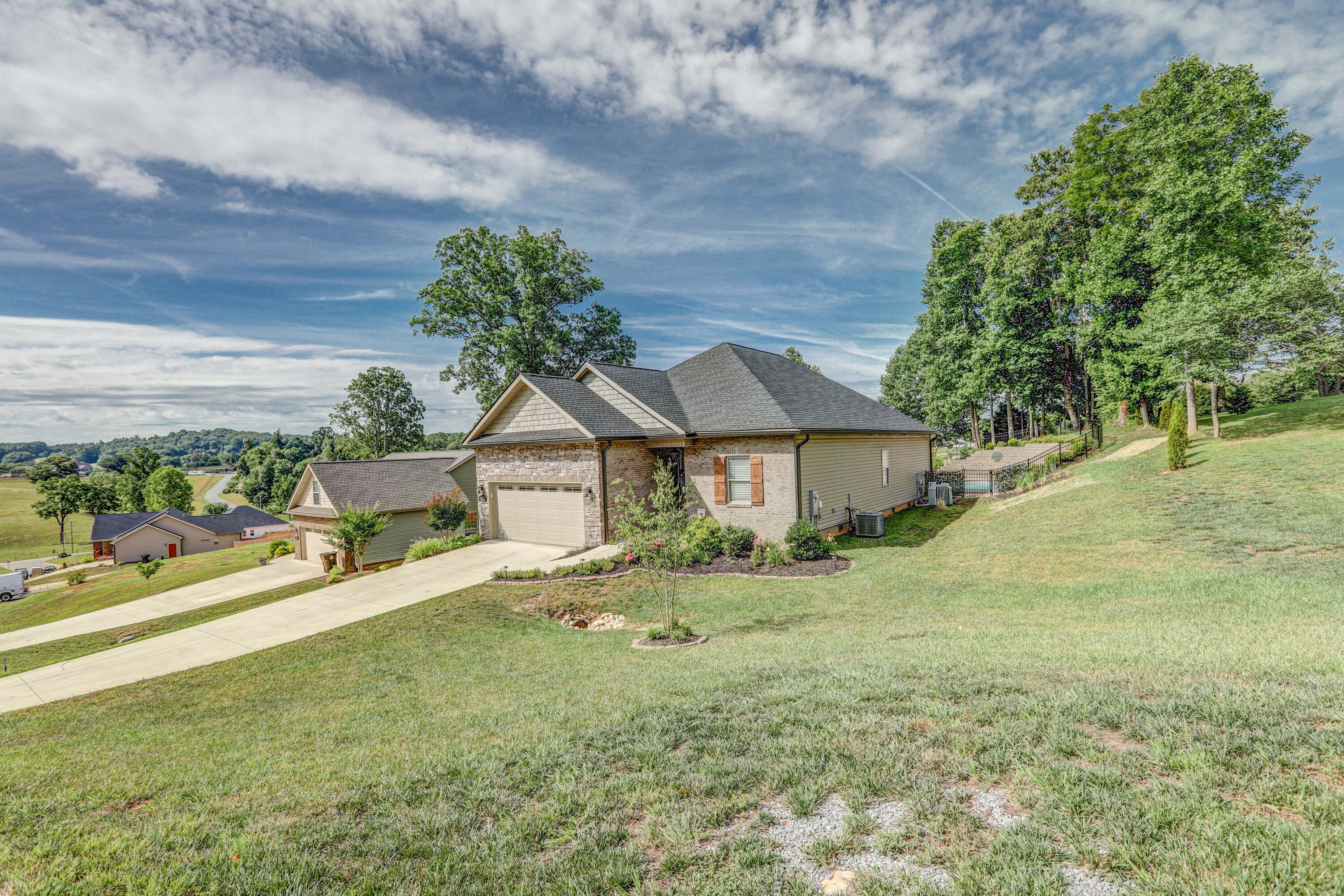 753 Pasture Ridge Road Piney Flats, TN 37686 - Photo 2 of 36 B42A8488_89_90_91_92