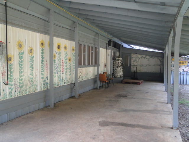4395 Dick George Road Cave Junction, OR 97523 - Photo 16 of 40 Attached 12'x44' carport