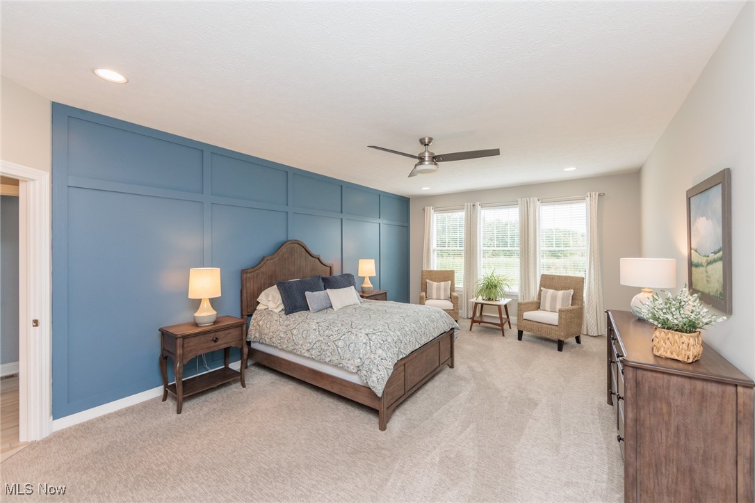 2041 Jaycox Road Avon, OH 44011 - Photo 28 of 50 Bedroom with a decorative wall, ceiling fan, light carpet, and recessed lighting