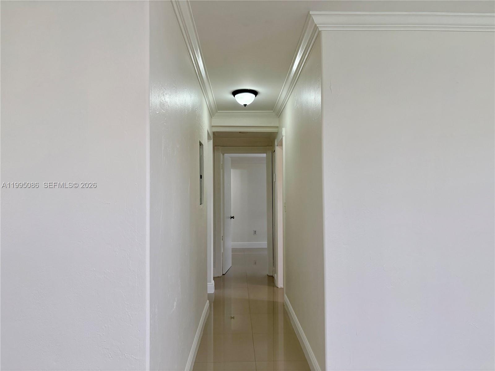 11315 Southwest 58th Terrace Miami, FL 33173 - Photo 14 of 26 a view of hallway with mirror