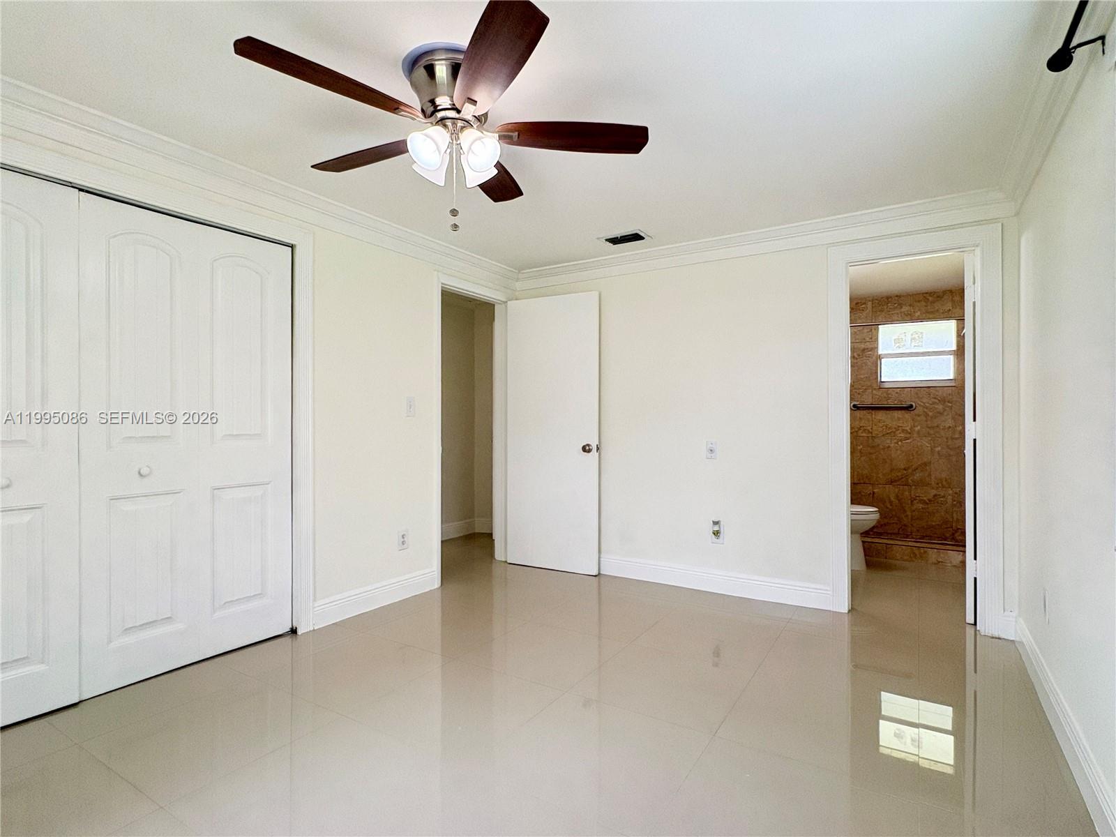 11315 Southwest 58th Terrace Miami, FL 33173 - Photo 17 of 26 wooden floor in an empty room
