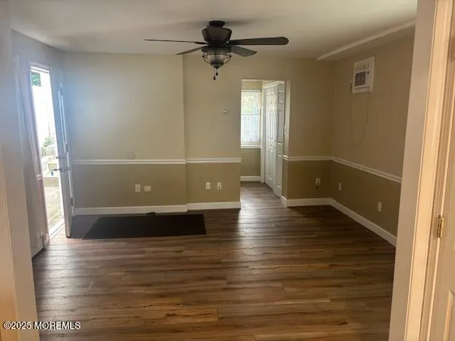 a view of bathroom with bathtub and wooden floor