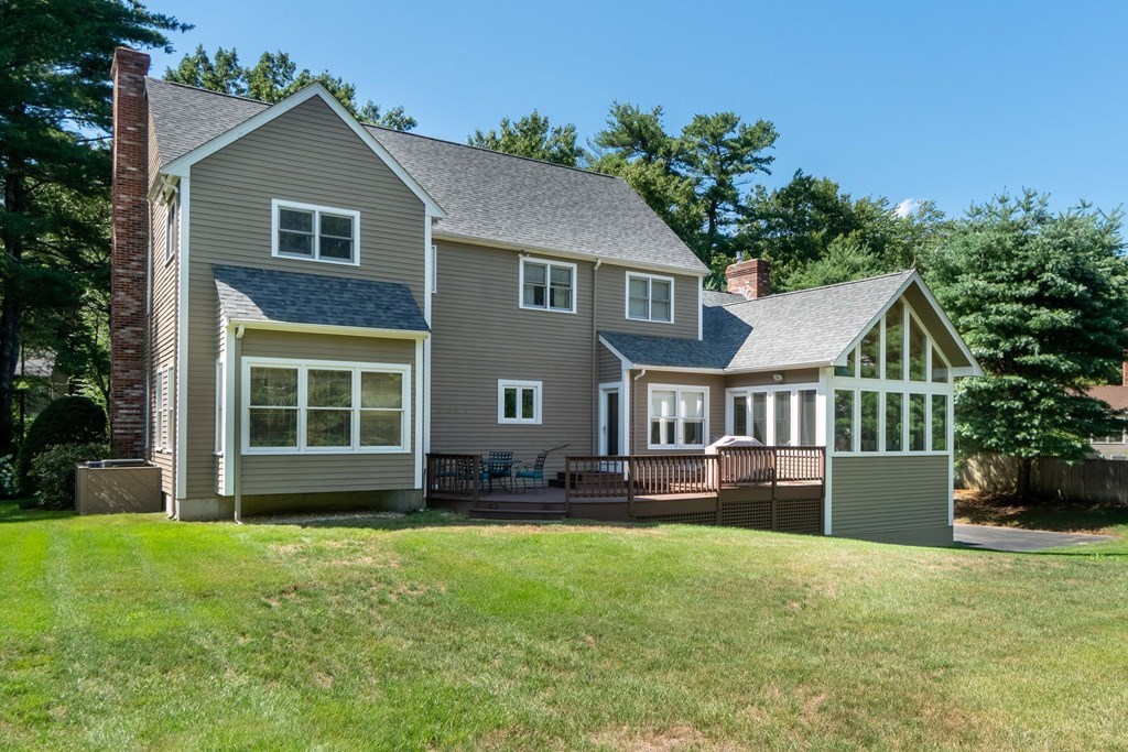 584 Dutton Road Sudbury, MA 01776 - Photo 27 of 29 front view of house with a yard