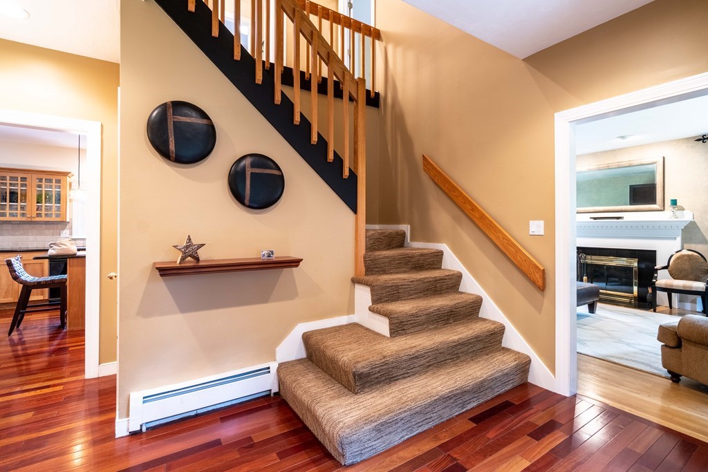 584 Dutton Road Sudbury, MA 01776 - Photo 3 of 29 a view of entryway and hall with wooden floor