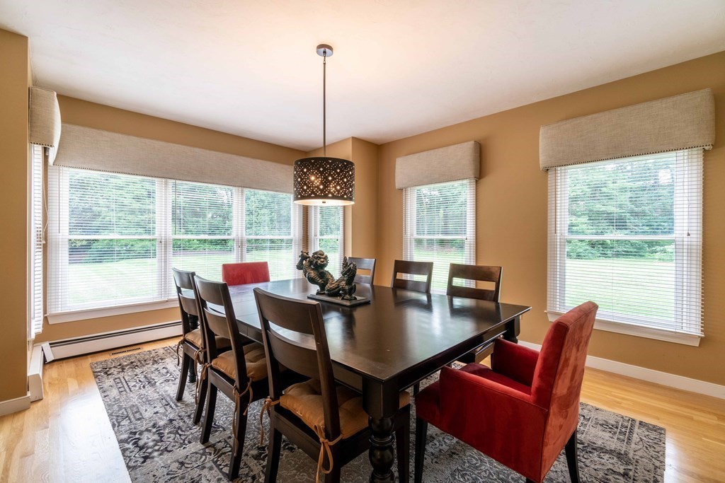 584 Dutton Road Sudbury, MA 01776 - Photo 5 of 29 a view of a dining room with furniture window and outside view
