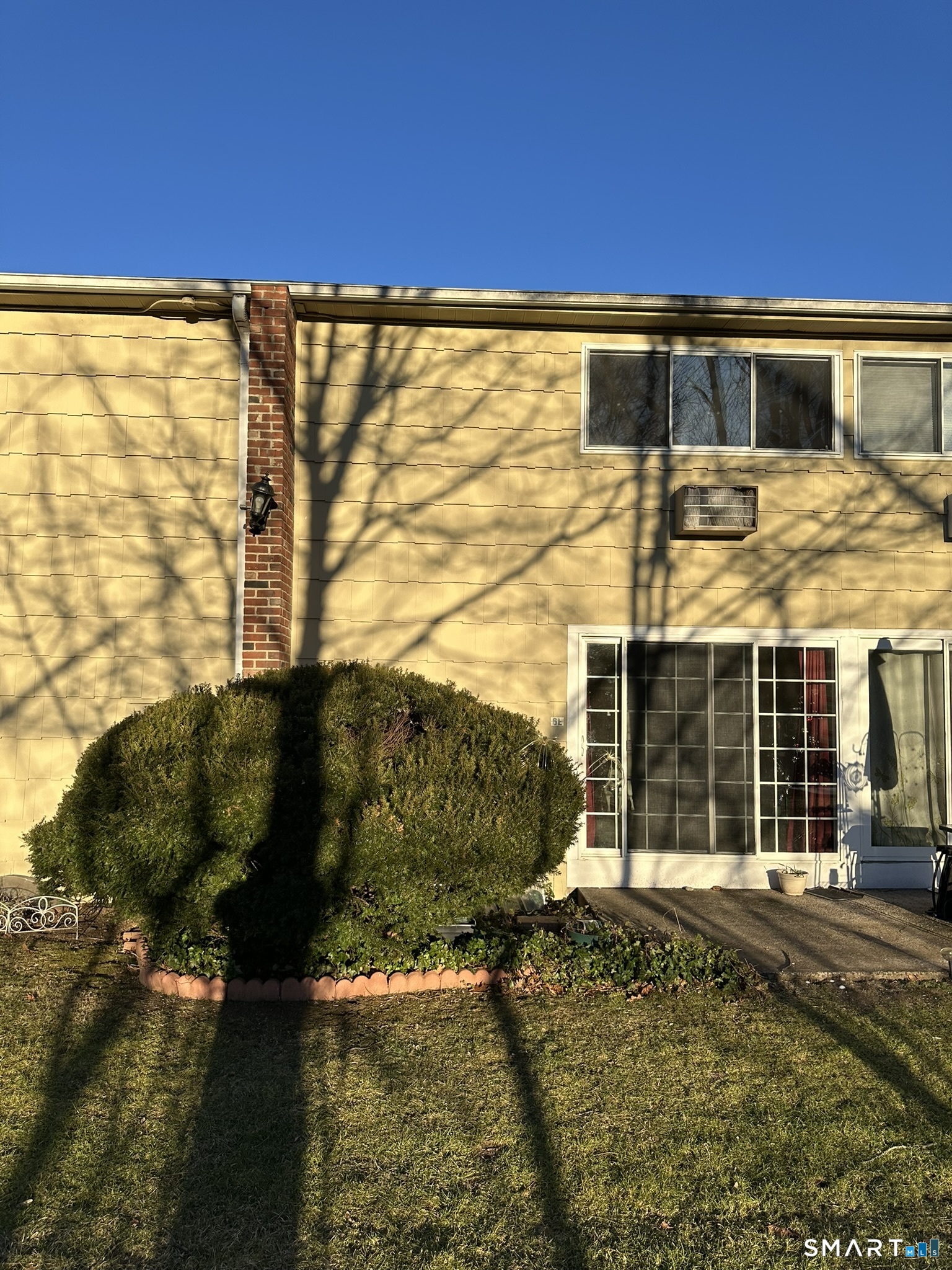 55 Porter Avenue, Unit 6E Naugatuck, CT 06770 - Photo 11 of 12 a view of a house with a backyard